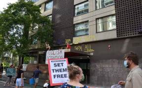 MELBOURNE, AUSTRALIA - JANUARY 06: Supporters gather outside Park Hotel where Novak Djokovic was taken pending his removal from the country after his visa was cancelled by the Australian Border Force in Melbourne, Australia on January 06, 2022.
