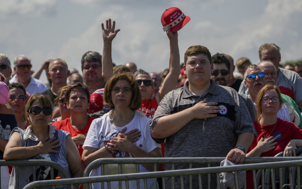 Supporters of Republican presidential candidate, former US President Donald Trump wait for the start of the campaign rally at Butler Farm Show Inc, on 13 July, 2024 in Pennsylvania.