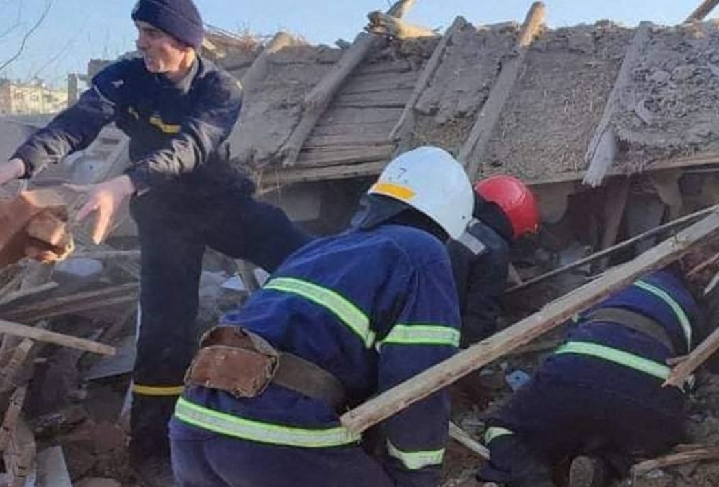 MYKOLAIV, UKRAINE - MARCH 13: (---MANDATORY CREDIT - "STATE EMERGENCY SERVICE OF UKRAINE ) Teams conduct search and rescue work after Russian airstrikes hit civil settlements in Mykolaiv, Ukraine on March 13, 2022.