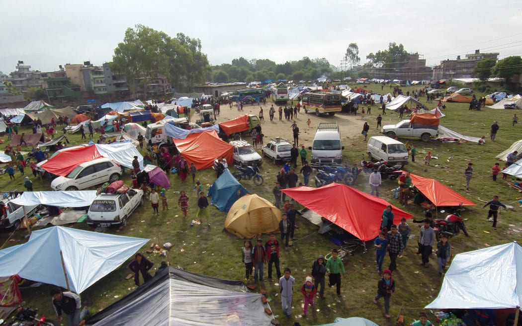 Aerial images show a campsite in the Chuchepati area of the Kathmandu Valley, Nepal.
