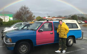 With a blue exterior and a bright pink door, Karen O'Leary's ute is unmissable.