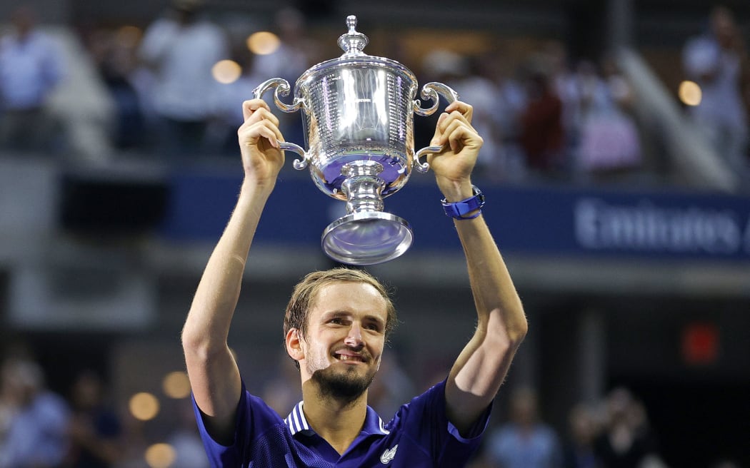 Daniil Medvedev of Russia celebrates with the championship trophy after defeating Novak Djokovic of Serbia to win the Men's Singles final match on Day Fourteen of the 2021 US Open at the USTA Billie Jean King National Tennis Center on September 12, 2021 in tNew York City.