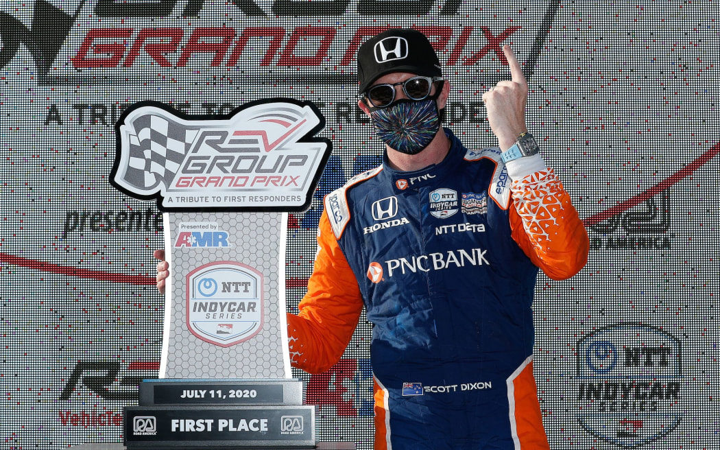 #9: Scott Dixon, Chip Ganassi Racing Honda, celebrates on the podium