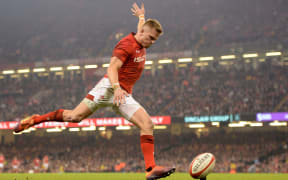 Gareth Anscombe of Wales kicks at goal