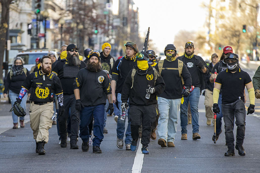 Members of the Proud Boys gather in support of President Donald Trump and in protest