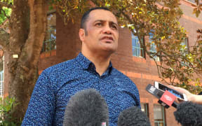 Hurimoana Dennis outside the High Court in Auckland on 23 November.