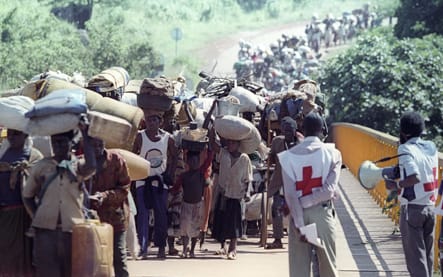 1994: Rwanda Red Cross volunteers monitoring and assisting displaced populations during the Rwandan Civil War.