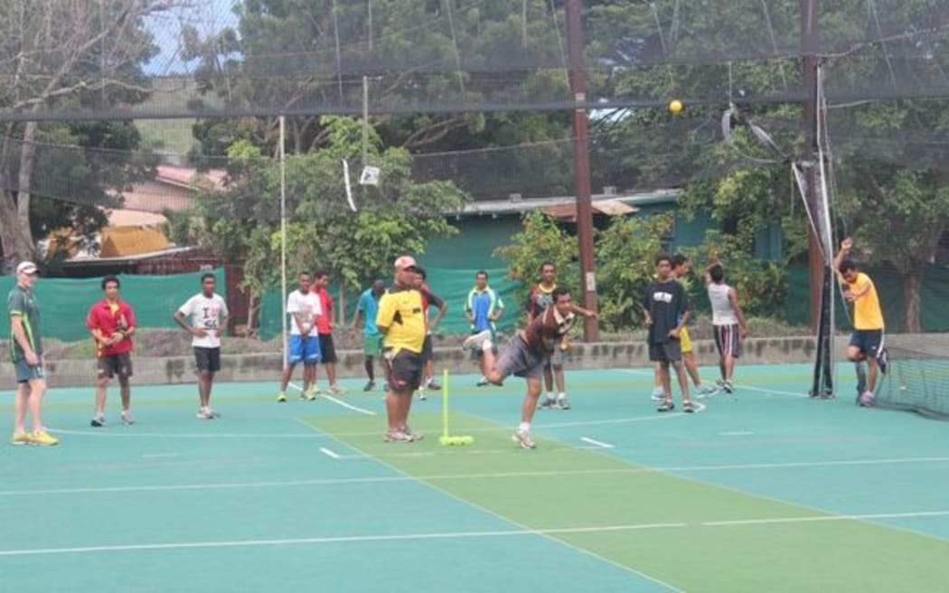 Young cricketers are put through their paces at a training session in Papua New Guinea.