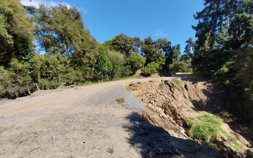 Damage on Waihau Road, where it is acting as a dam against a small lake in Dartmoor near Napier.