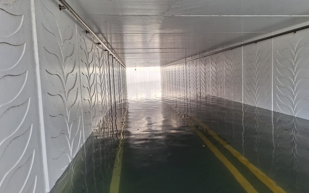 The flooded Petone railway underpass on the nearly-new $70 million cycleway.