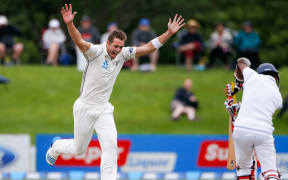 Tim Southee takes a wicket against Sri Lanka 2014.