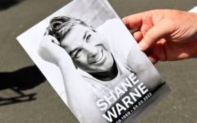 A funeral program is held after a private memorial service for Australian cricket superstar Shane Warne in Melbourne on March 20, 2022.