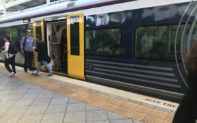 A crowded Auckland train as 'March madness', combined with a rail worker strike, begins.