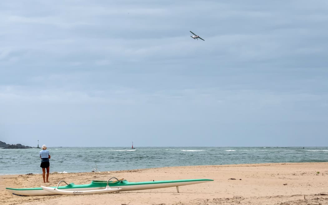 A Coastguard Air Patrol plane searches the sea off Ngunguru, east of Whangārei, for missing fisherman Ethan Neels, 23. Photo: Supplied / Malcolm Pullman