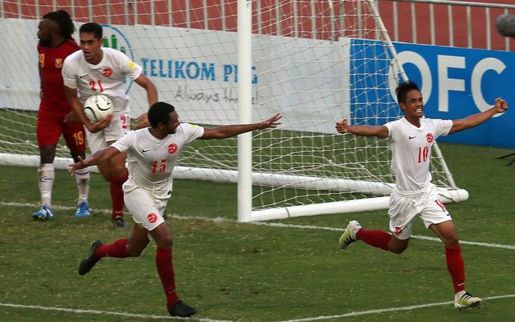 Tahiti's Teaonui Tehau scores the equalising goal against PNG.