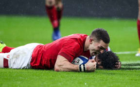 Wales' George North scores a try against France