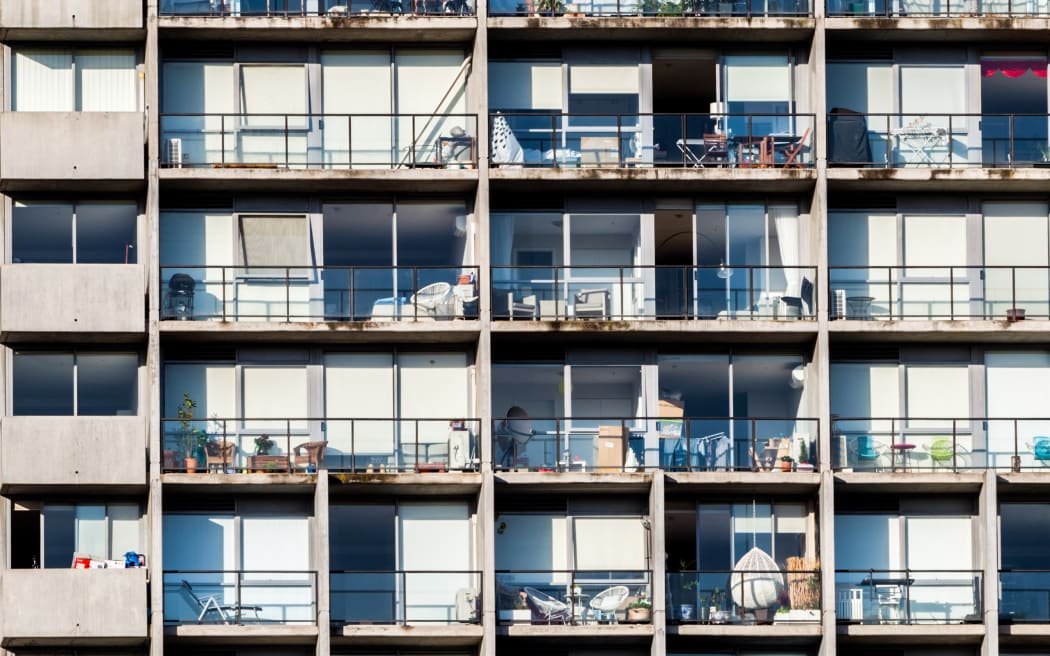 Residential building facade - closeup of many windows - how people live in Melbourne CBD.