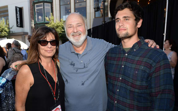 Actor/Producer/Director Rob Reiner (center) and wife Michele Singer (L) and son Nick Reiner (R) attend Teen Vogue's Back-to-School Saturday kick-off event at The Grove on August 9, 2013 in Los Angeles, California.