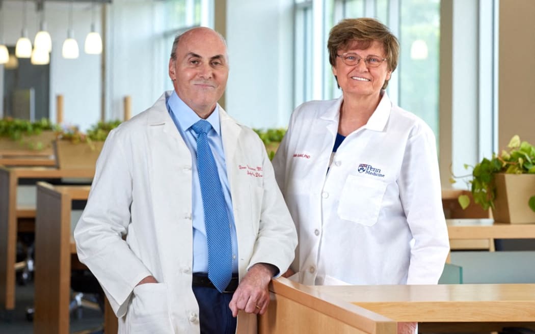This undated handout image courtesy of the University of Pennsylvania School of Medicine shows Dr. Drew Weissman and Dr. Katalin Karikó.