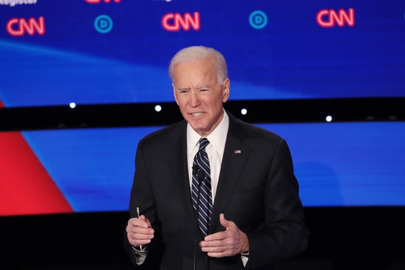 Former Vice President Joe Biden delivers his closing statement during the Democratic presidential primary debate at Drake University on January 14, 2020.