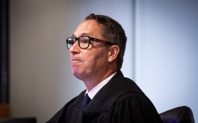Judge Evangelos Thomas presides over day 2 of the  Whakaari White Island eruption trial at the Auckland Environment Court.
12 July 2023. New Zealand Herald photograph by Jason Oxenham