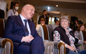 National leader Christopher Luxon speaks to a Malvina Major retirement village resident while on the campaign trail in Khandallah, Wellington on 11 September, 2023.