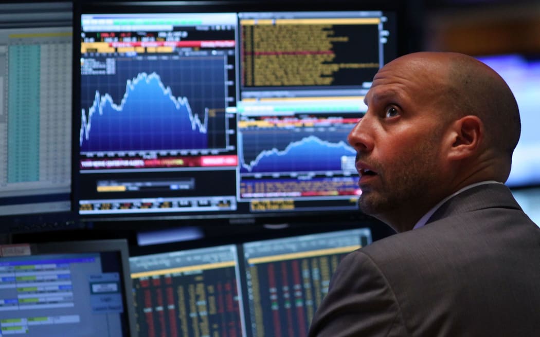A trader on the floor of the New York Stock Exchange on Monday.
