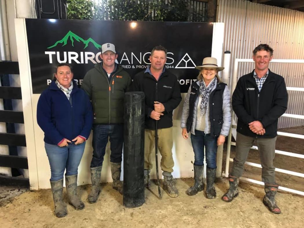 New bull owners Kylie and Ben Johnson (L) and  Penny Hoogerbrug with her stud manager Nick Carr (R). The bull's former owner  Andrew Powdrell of Turiroa Angus is in the middle.