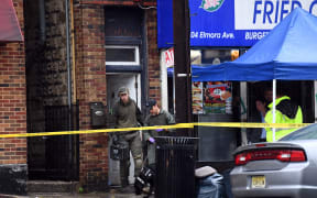 FBI officers searched the family restaurant and apartment of Ahmad Khan Rahami in Elizabeth, New Jersey, on 19 September 2016. .