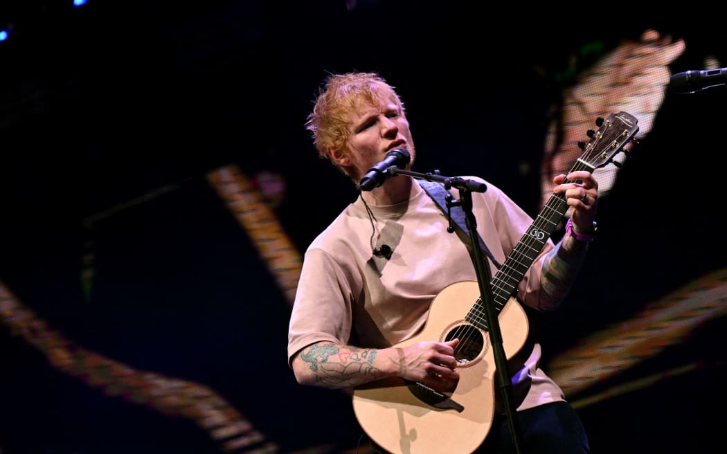 BOSTON, MASSACHUSETTS - DECEMBER 14: Ed Sheeran performs during iHeartRadio KISS108's Jingle Ball 2025 Presented By Capital One at TD Garden on December 14, 2025 in Boston, Massachusetts.   Paras Griffin/Getty Images for for iHeartRadio/AFP (Photo by Paras Griffin / GETTY IMAGES NORTH AMERICA / Getty Images via AFP)