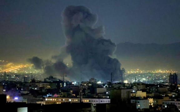Smoke plumes rise following missile strikes in Tehran on March 1, 2026. The United States and Israel launched strikes against Iran on February 28, killing Iran's supreme leader and top military leaders, prompting authorities to retaliate with strikes on Israel and US bases across the Gulf.