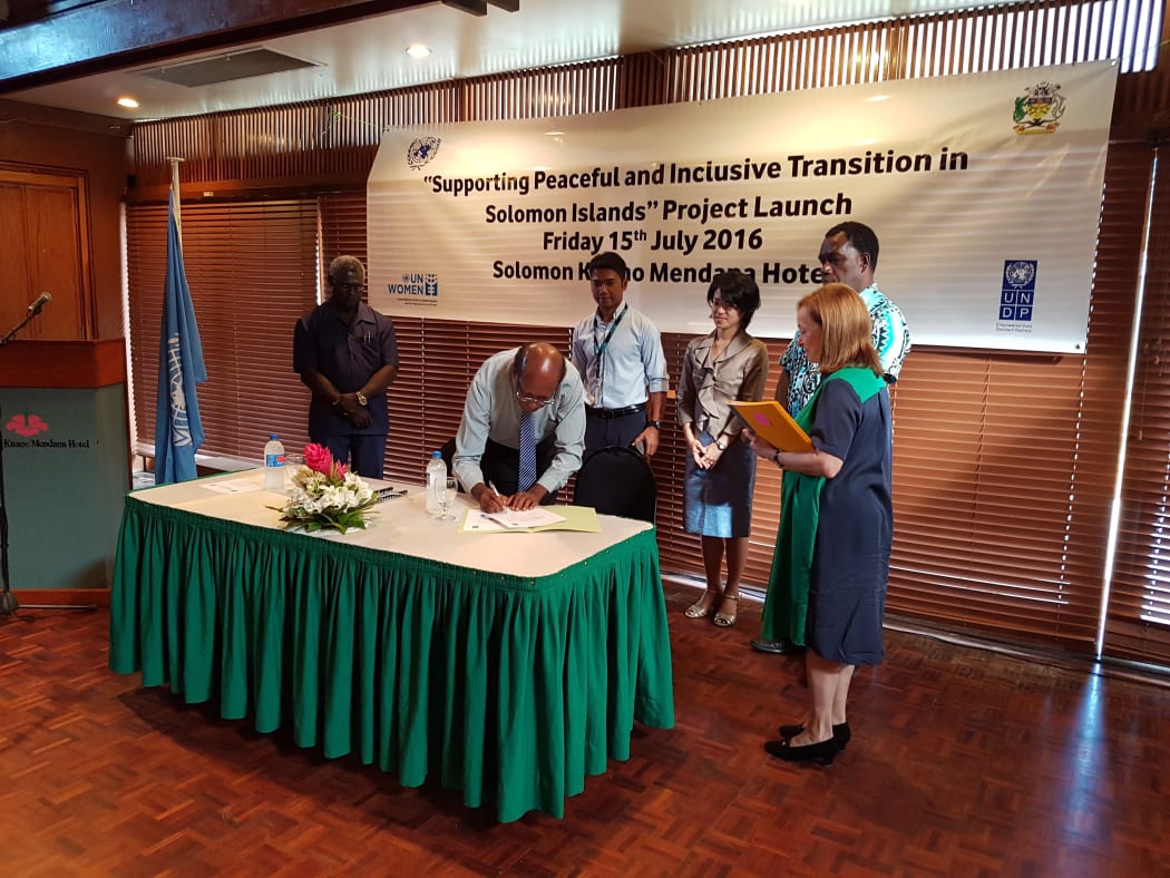 The Prime Minister, Manasseh Sogavare (far leftleft) and The UN's Osnat Lubrani (far right) at the launch of a UN Peacebuilding Programme in Honiara.