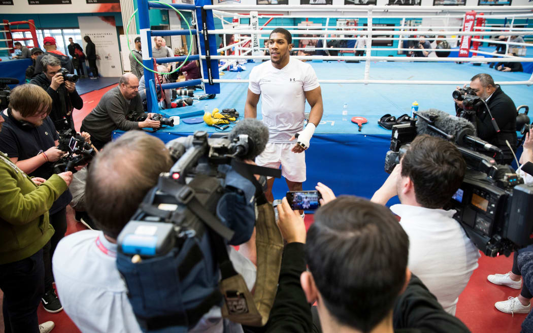 Unified world champion heavyweight boxer Anthony Joshua in a solo media scrum