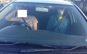 The man and his fake passenger.