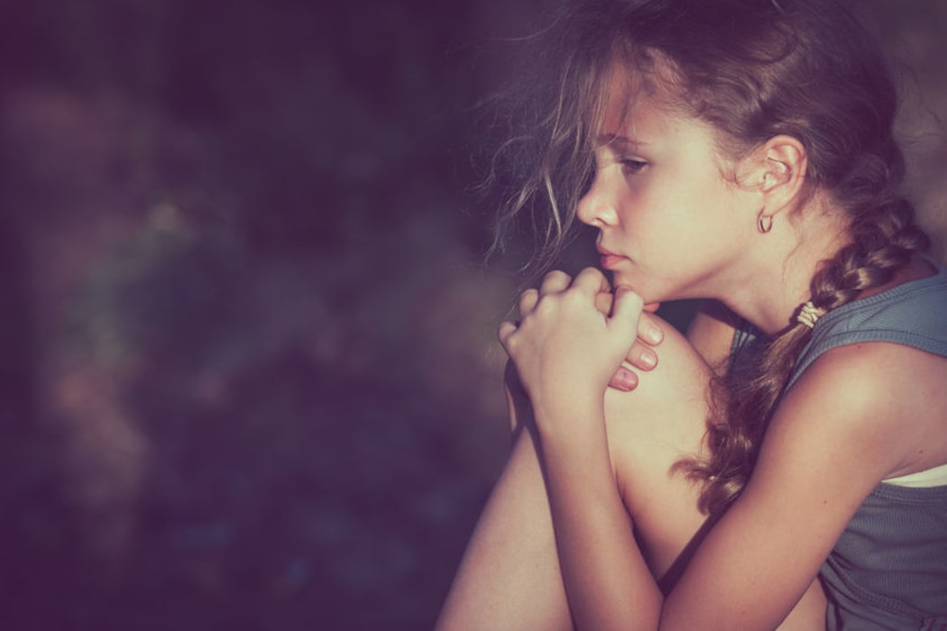 46448655 - portrait of sad teen girl at the day time.
