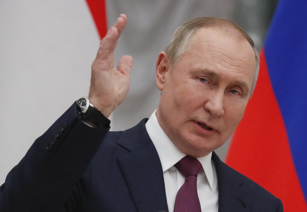 Russian President Vladimir Putin gestures as he talks during a press conference with Hungarian Prime Minister after their meeting at the Kremlin in Moscow on 1 February, 2022.