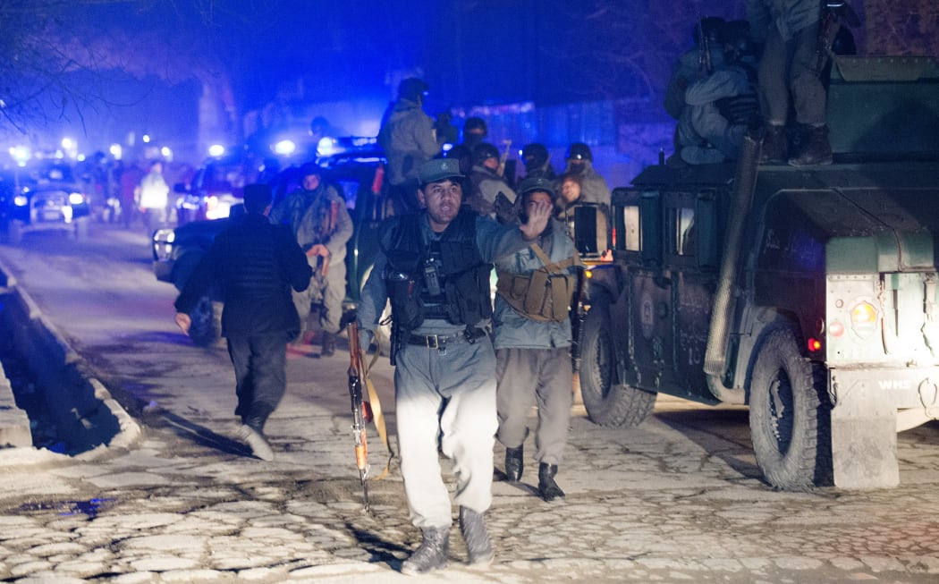 Afghan police at the scene of the explosion.