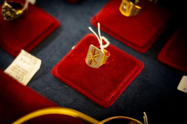 Ecclesiastical rings bearing the Greek letters "Chi" and "Rho" — the first two letters of the Greek word for Christ.