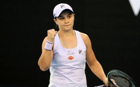 Australia's Ashleigh Barty celebrates after winning against Montenegro's Danka Kovinic during their women's singles match on day two of the Australian Open tennis tournament in Melbourne on February 9, 2021.