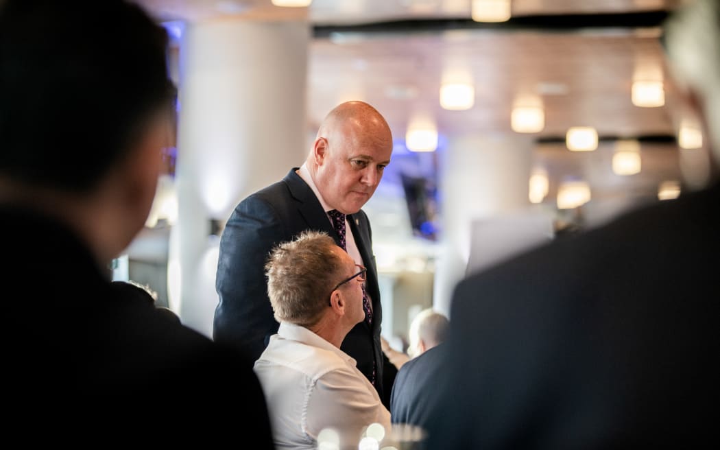 Luxon working the room at a post-Budget breakfast in the South Stand of Eden Park.