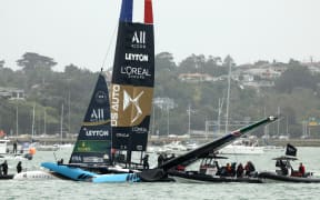 AUCKLAND, NEW ZEALAND - FEBRUARY 14: A collission between Black Foils driven by Peter Burling and Blair Tuke and DS Team France, driven by Quentin Delapierre  during SailGP on February 14, 2026 in Auckland, New Zealand. (Photo by Phil Walter/Getty Images)