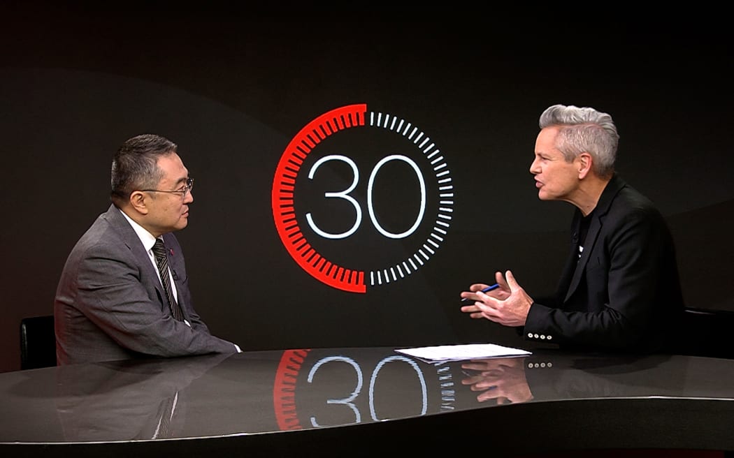 Chinese ambassador Wang Xiaolong in studio for '30 with Guyon Espiner'.