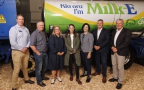 Fonterra and Nestle staff with Prime Minister Jacinda Ardern.