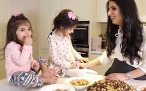 Reem Kassis with her daughters