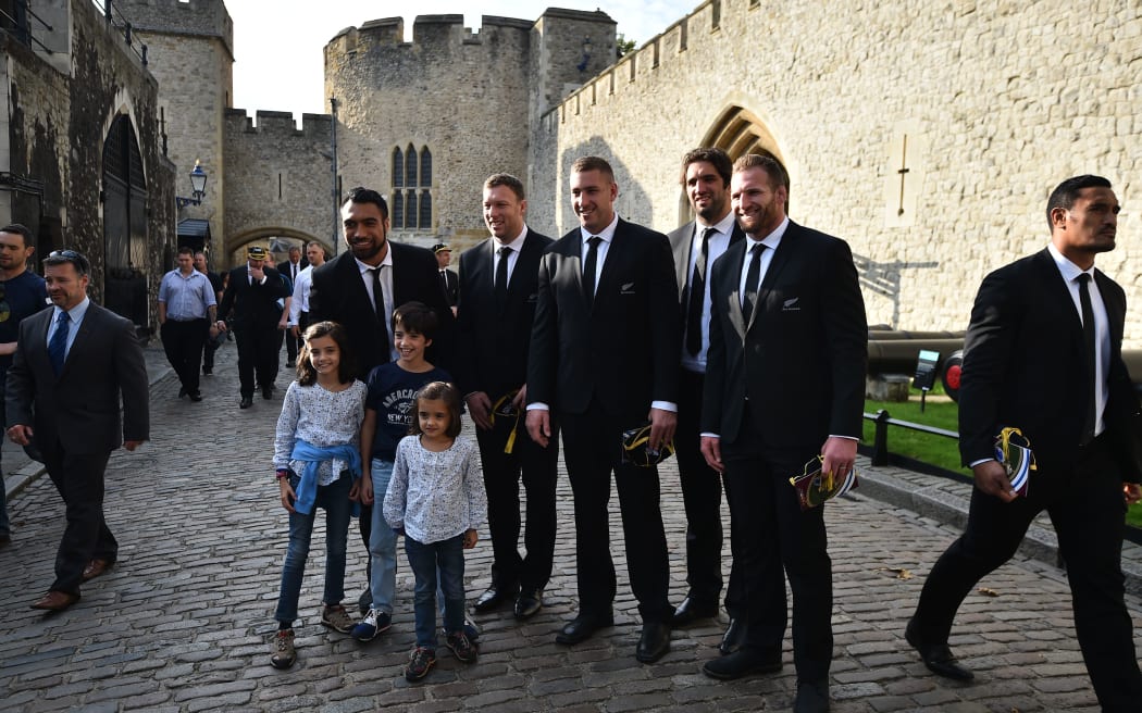 New Zealand's Victor Vito, Wyatt Crockett, Luke Romano, Sam Whitelock and Kieran Read pose for a photograph as they attend a welcoming ceremony for the All Blacks.