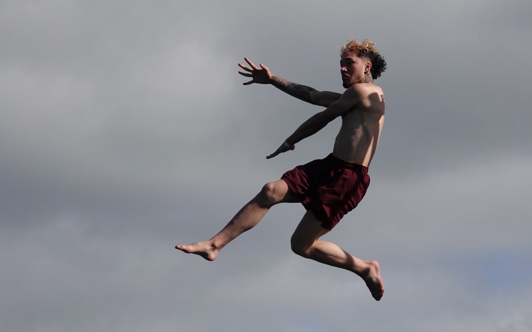 Laetin George, of Waikare in Northland, demonstrates the cheese-cutter in the final round.