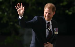 Prince Harry, Duke of Sussex, waves as he arrives to attend a ceremony marking the 10th anniversary of the Invictus Games, at St Paul's Cathedral in central London, on 8 May, 2024.