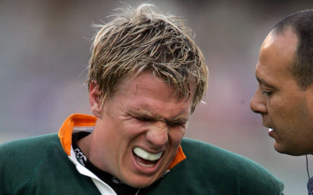Jean De Villiers after suffering one of a long list of injuries, against Scotland in 2006 at ABSA Stadium, Durban, South Africa. South Africa won the match 36-16. Photo: Africa Visuals/PHOTOSPORT**NZ USE ONLY**
