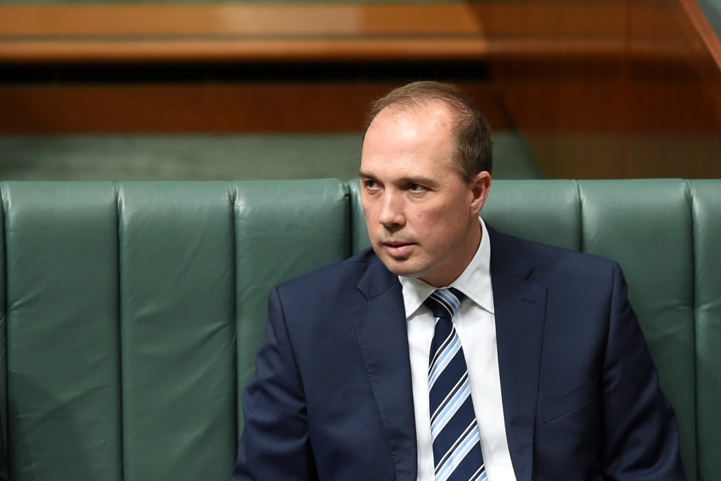 Australian Immigration Minister Peter Dutton reacts during House of Representatives Question Time at Parliament House in Canberra, Monday, Nov. 9, 2015.