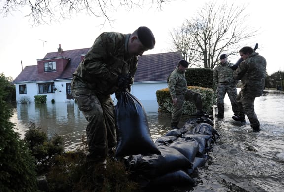 Soldiers laying sandbags in Wraysbury, west of London.